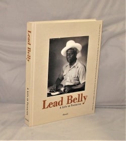 Item #28332 Lead Belly: A Life in Pictures. Edited by Tiny Robinson and John Reynolds....